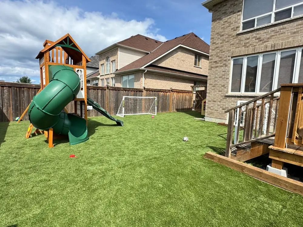 Backyard finished with artificial turf
