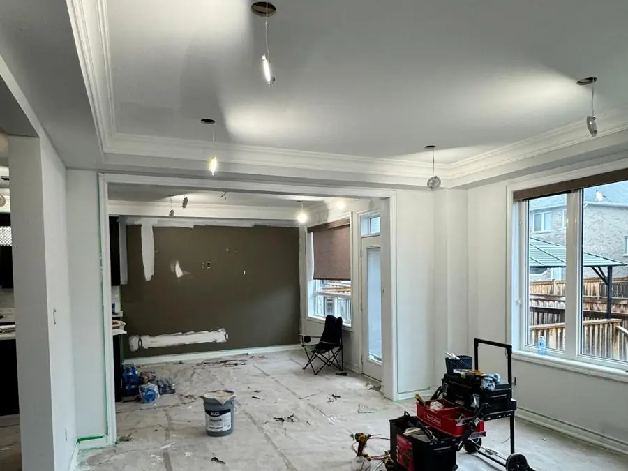Second room sheeted and prepped for paint